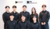 A group of eight individuals in black shirts poses for a photo, with logos for ECHTEC Korea and d&b audiotechnik displayed above.